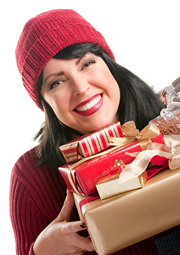 Happy smiling woman holding a stack of gifts