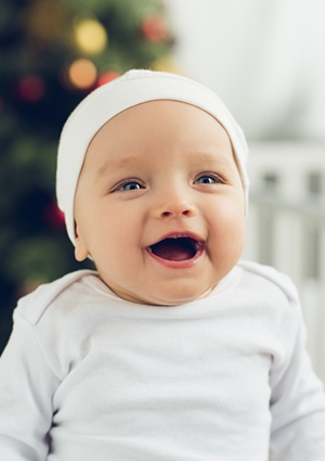 Happy baby with big smile for the camera