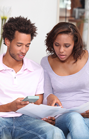 Black couple working on family budget