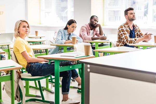 Students attentive during collage class.