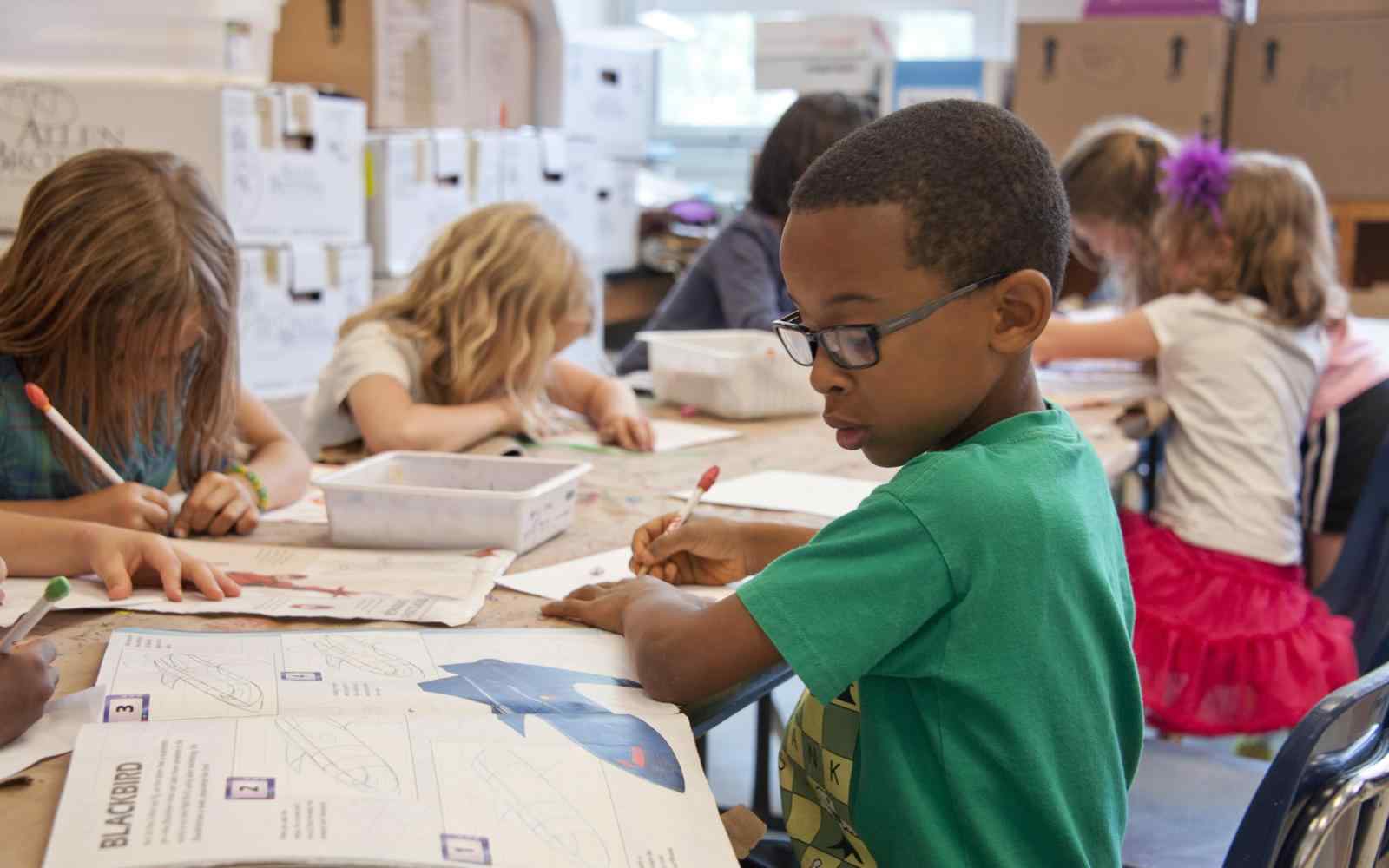 Students working in school classroom