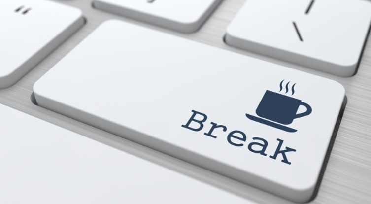 The return key on a computer keyboard the word 'break' below the pictures of a coffee cup.