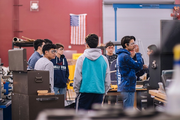 Group of teen boys in a high school shop class.