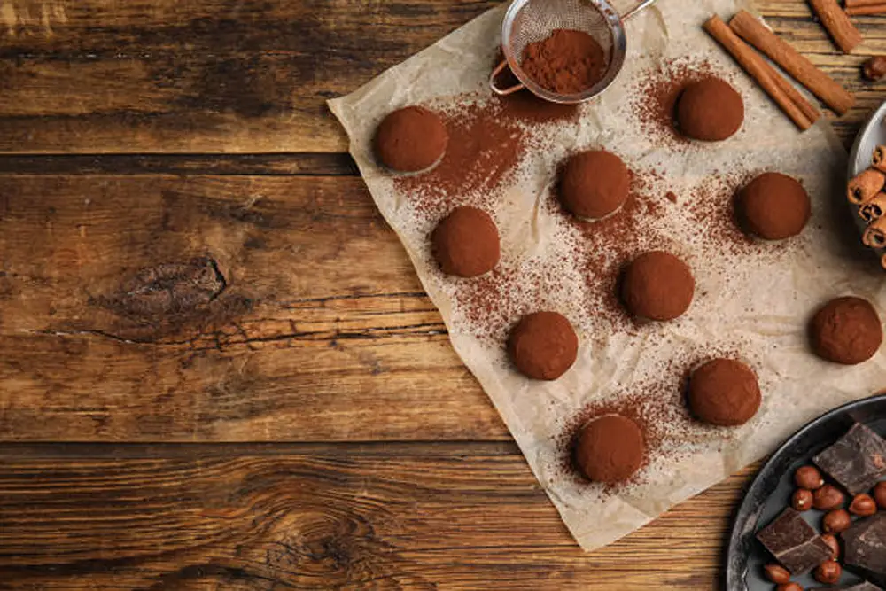 Candy being made in kitchen with cinnamon sprinklings. 