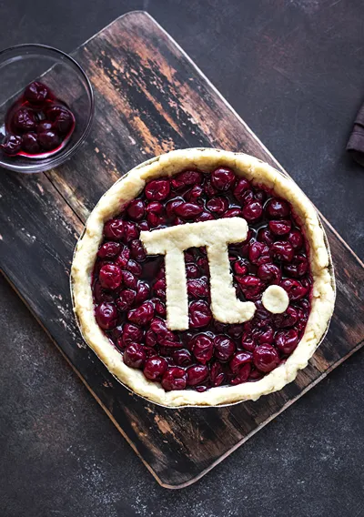 Celebrating Pi Day with the Pi symbol π. baked in a delicious pie.