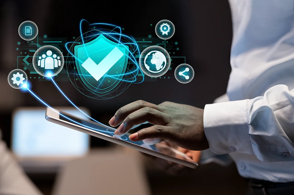 Hands of professional man looking a security details on a tablet.